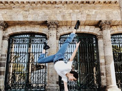 Dynamic movement showing body alignment and control.