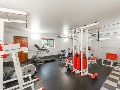 Organized minimalist training space with simple equipment.